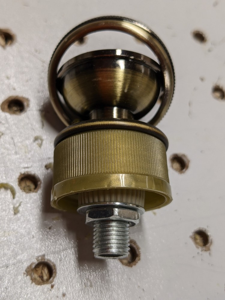 Adding a plug below the screw top.